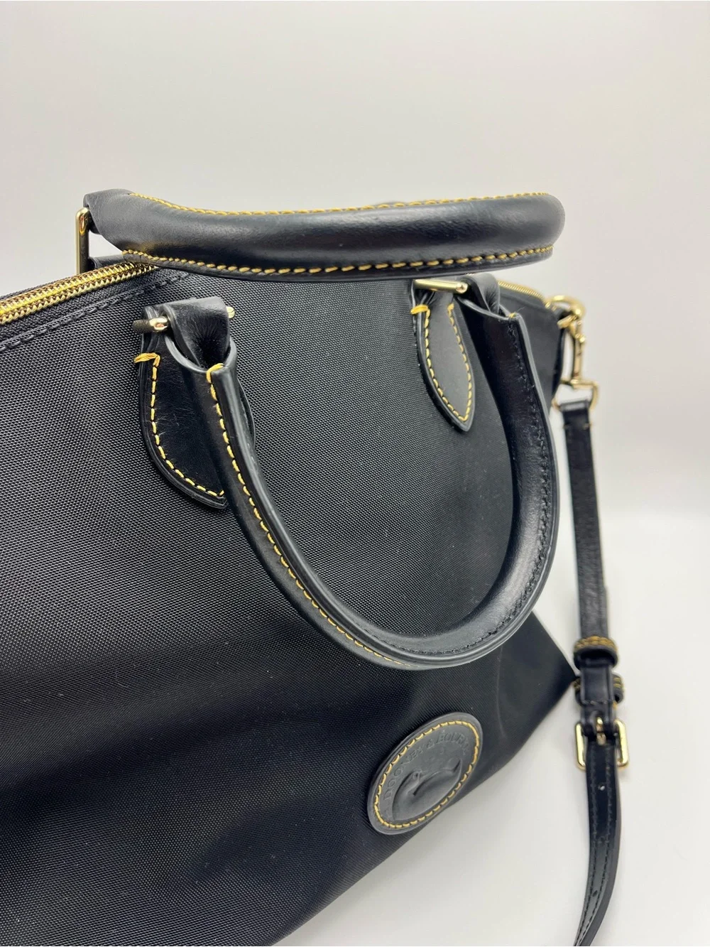 Dooney & Bourke Black Nylon Satchel with Yellow Contrast Stitching Red Lining